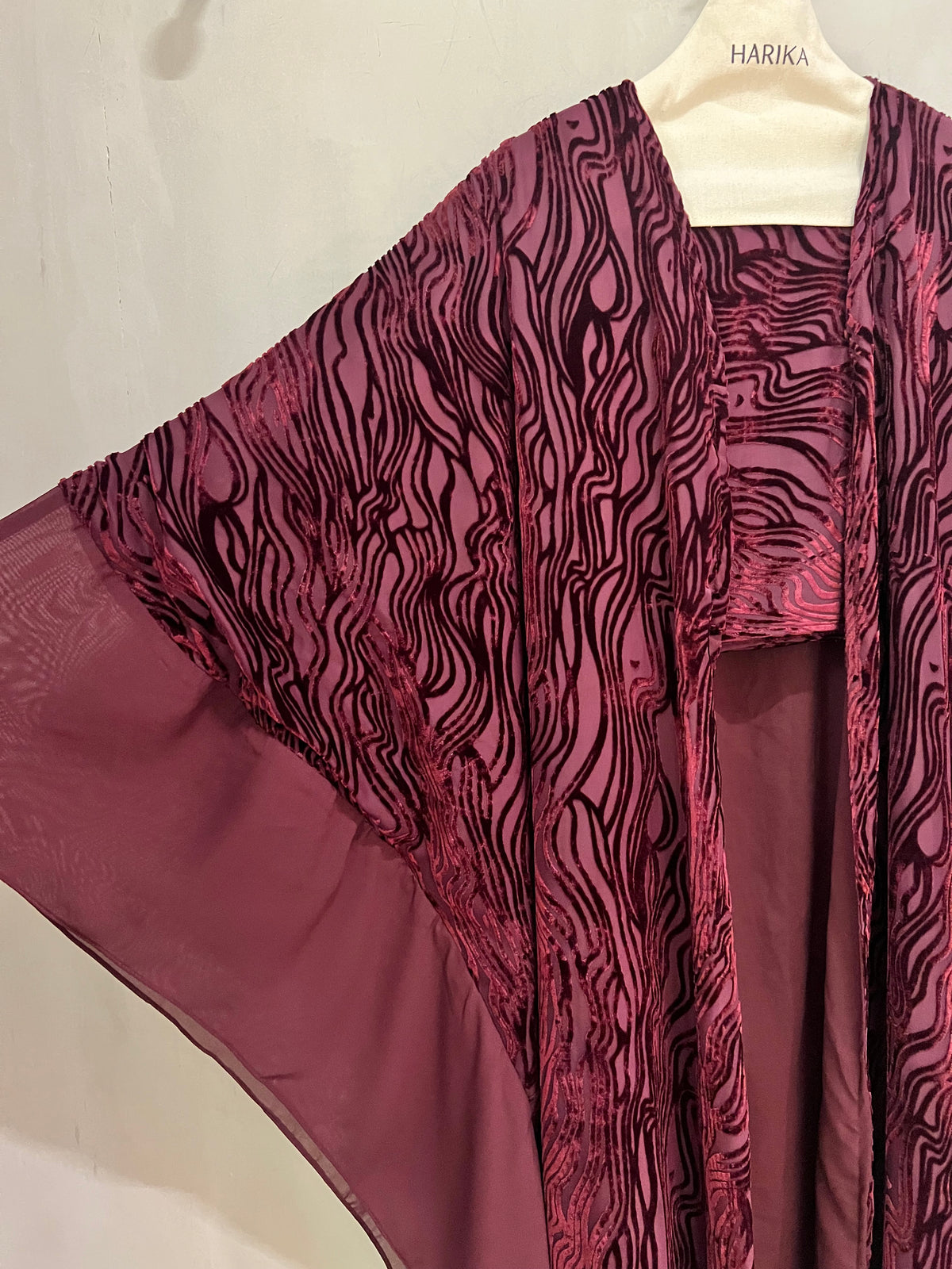 Abaya- an eye-catching deep burgundy wave-pattern design