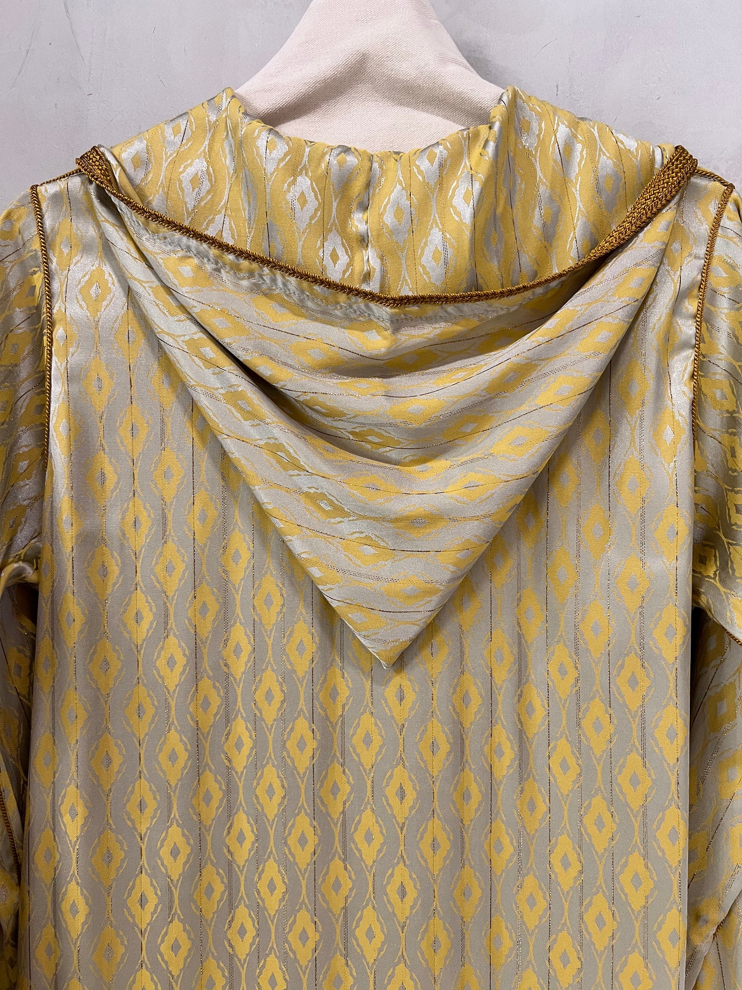 Jalabiyah - Elegant Soft beige base hooded with luminous gold pattern and embroidery