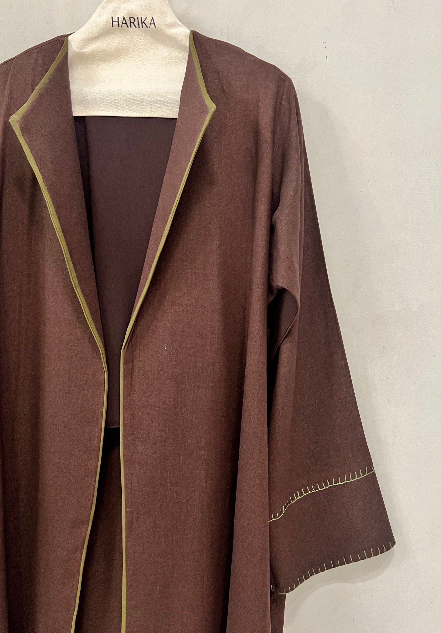 Abaya - Chocolate Brown - Clean tailoring with subtle contrast piping and delicate stitch details on the sleeves
