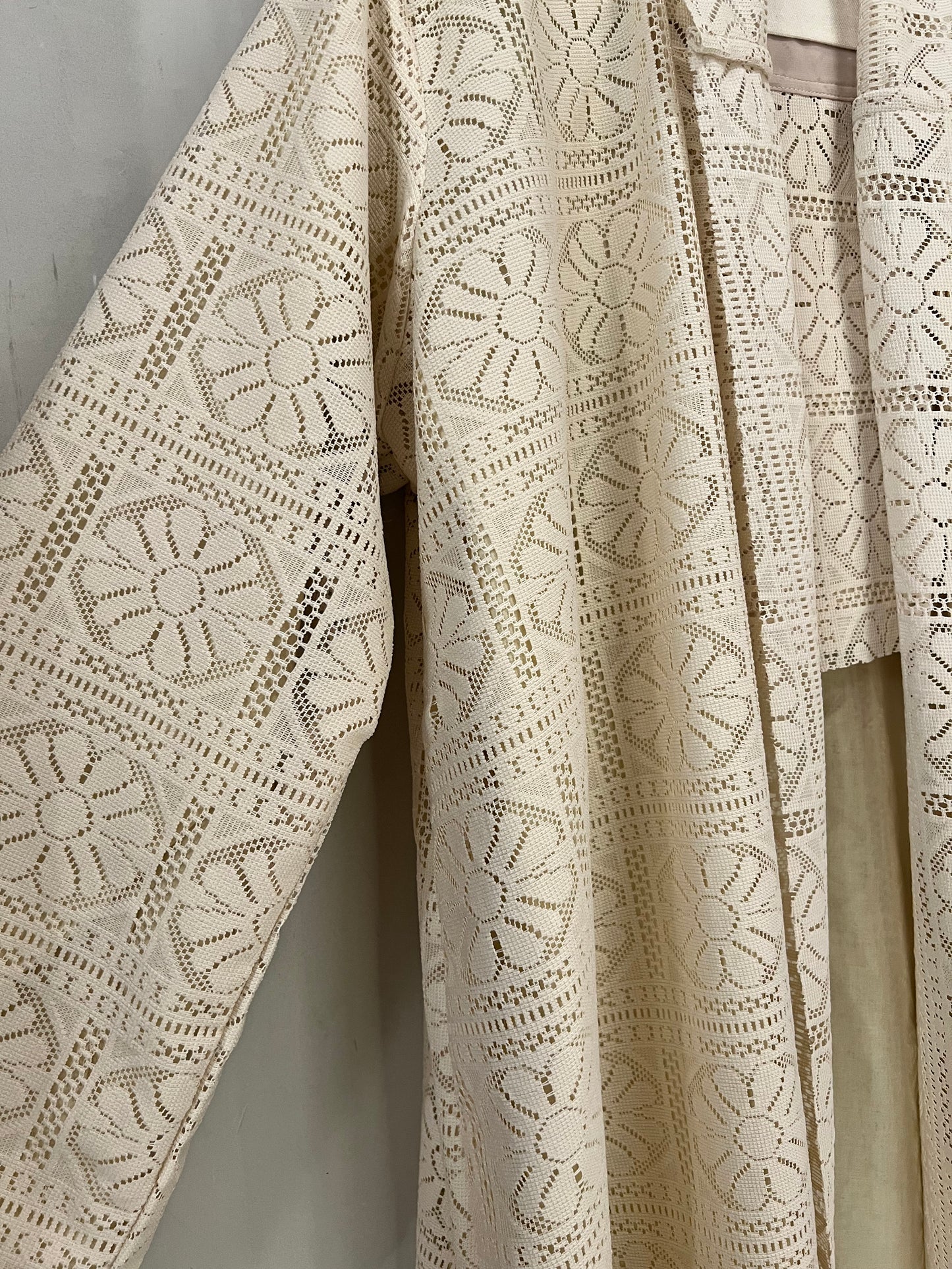 Abaya - a soft cream-beige color with an elegant floral lace overlay