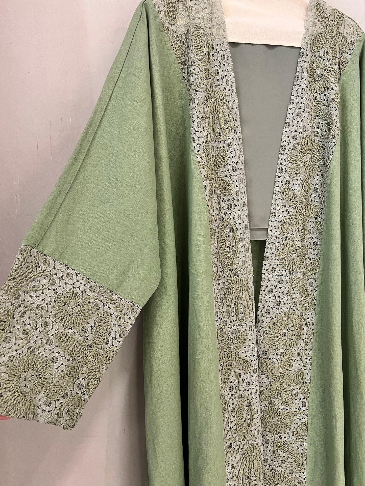 Abaya - Sage green exudes sophistication with its soft, earthy tone and refined lace detailing