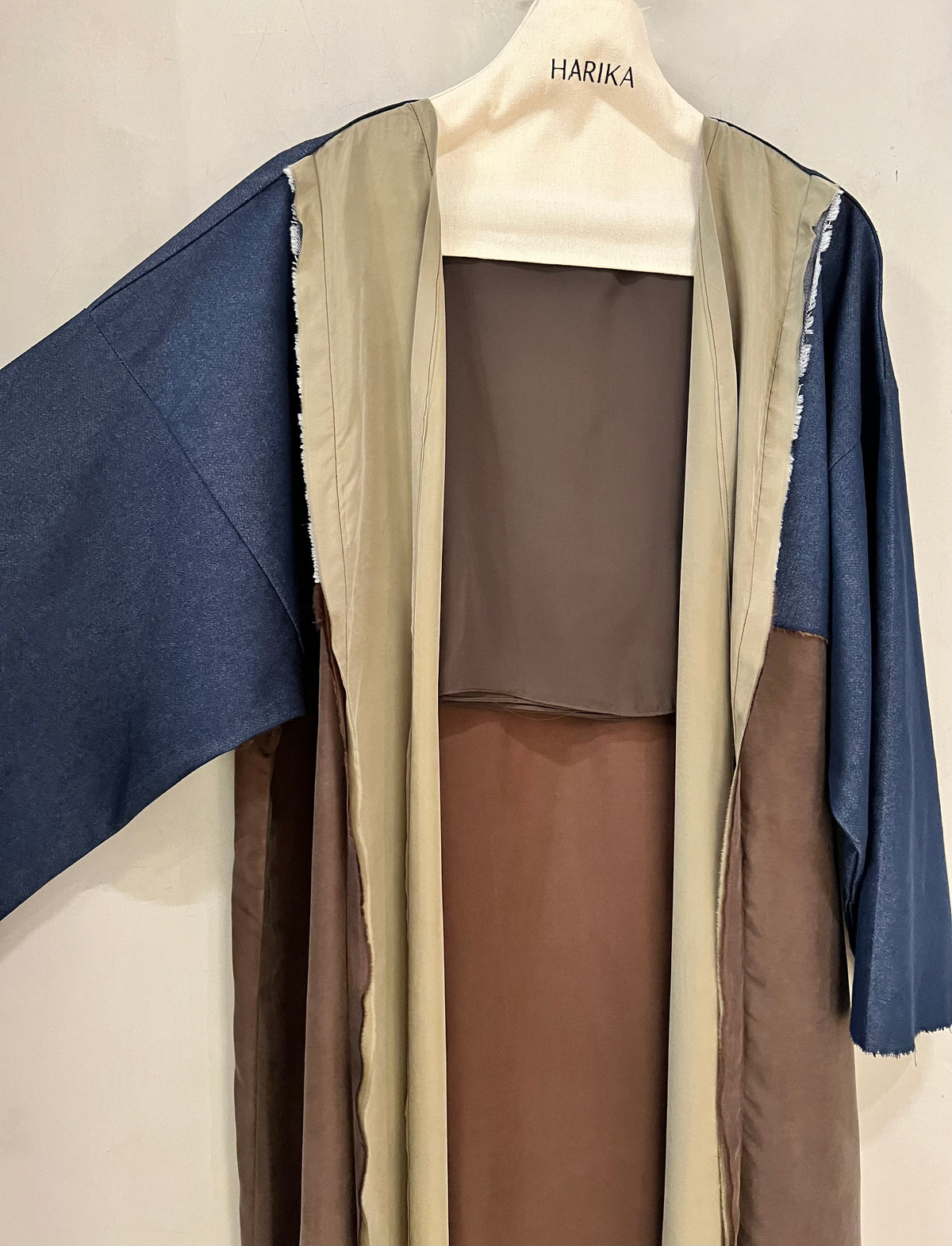 Abaya- a rich chocolate brown base accented with soft taupe panels and elegant deep navy sleeves