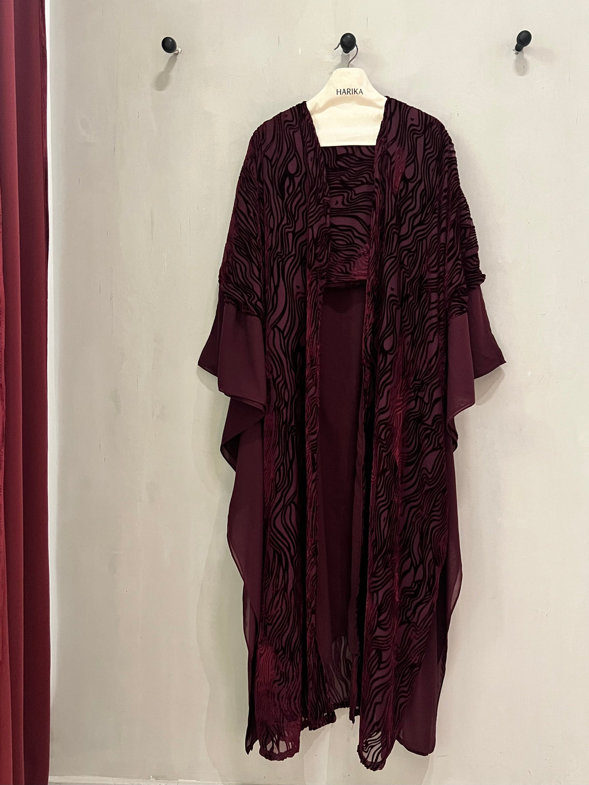 Abaya- an eye-catching deep burgundy wave-pattern design