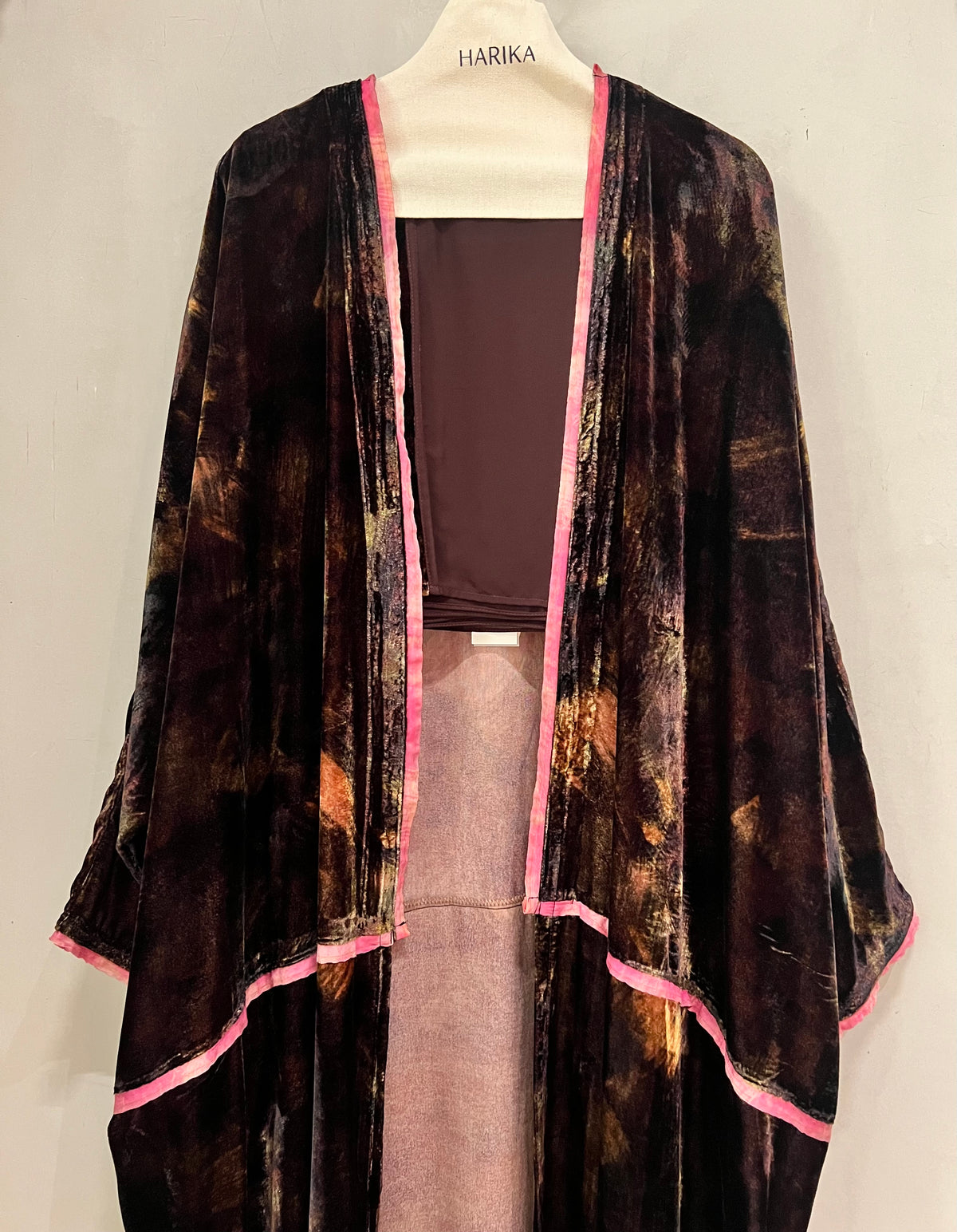 Abaya- stunning brown velvet abaya, beautifully accented with elegant pink piping for a touch of feminine sophistication