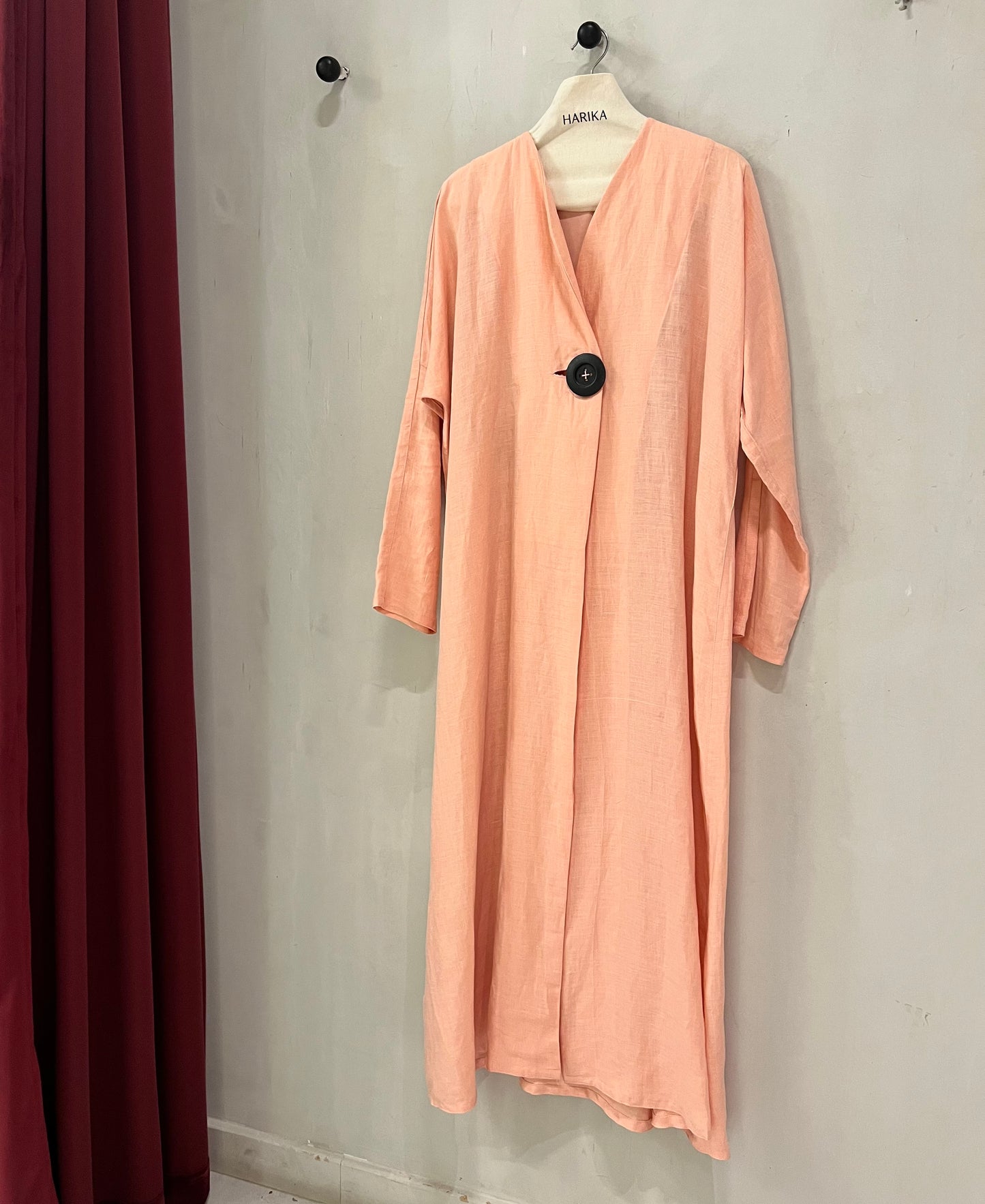 Abaya - Peach with elegant single statement button closure