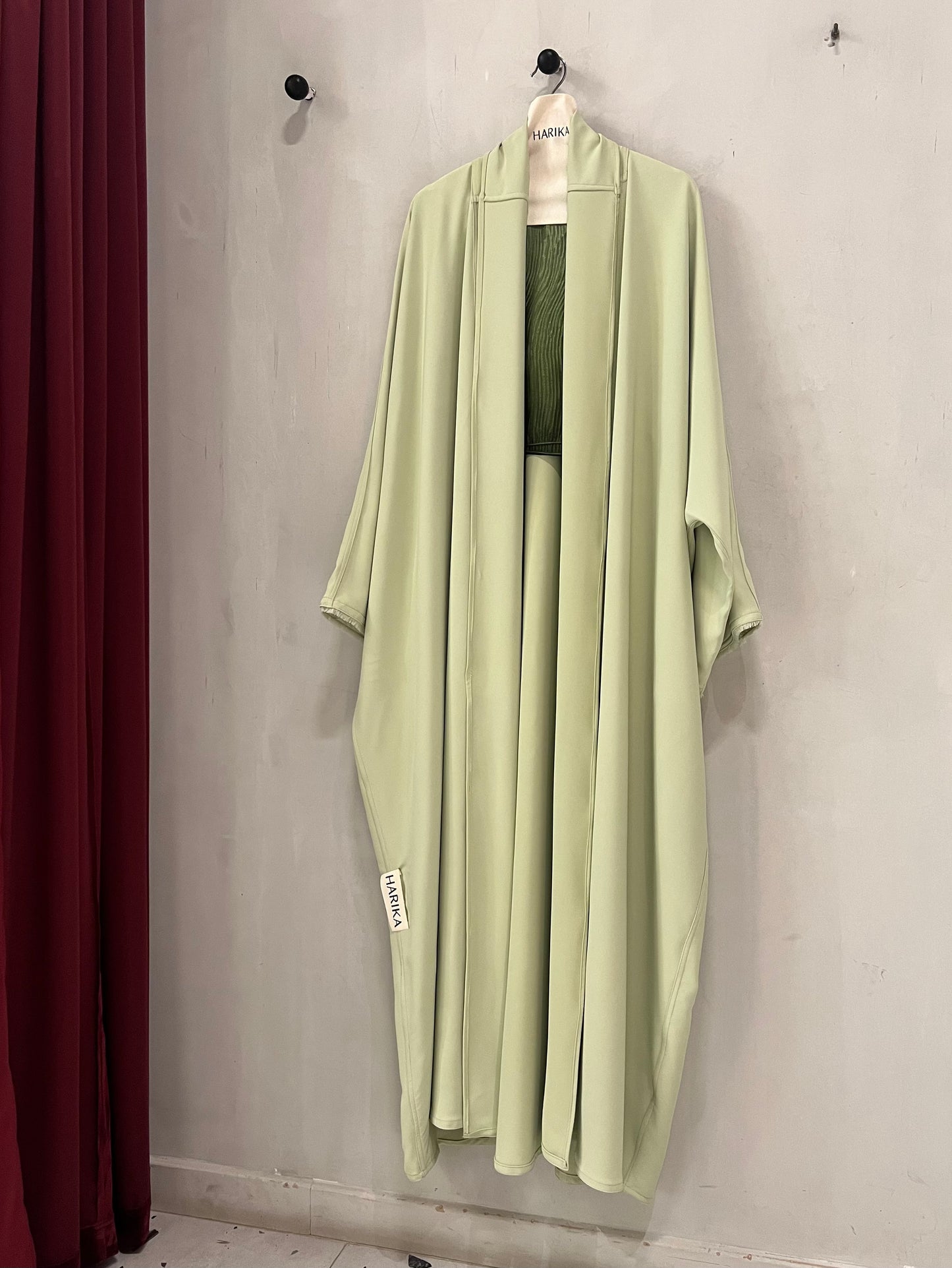 Abaya - Elegant Pistachio Color with Frayed Sleeve Detail