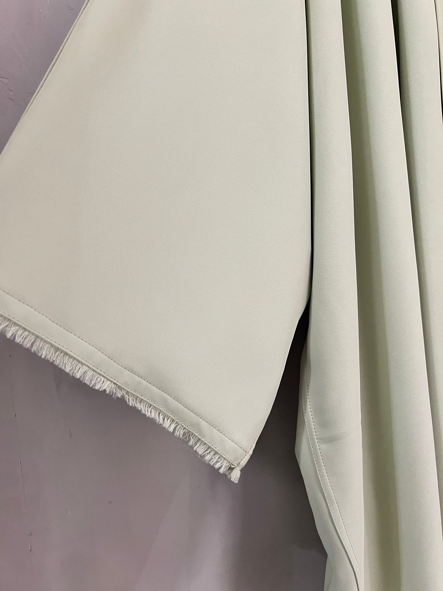 Abaya - Elegant Pistachio Color with Frayed Sleeve Detail
