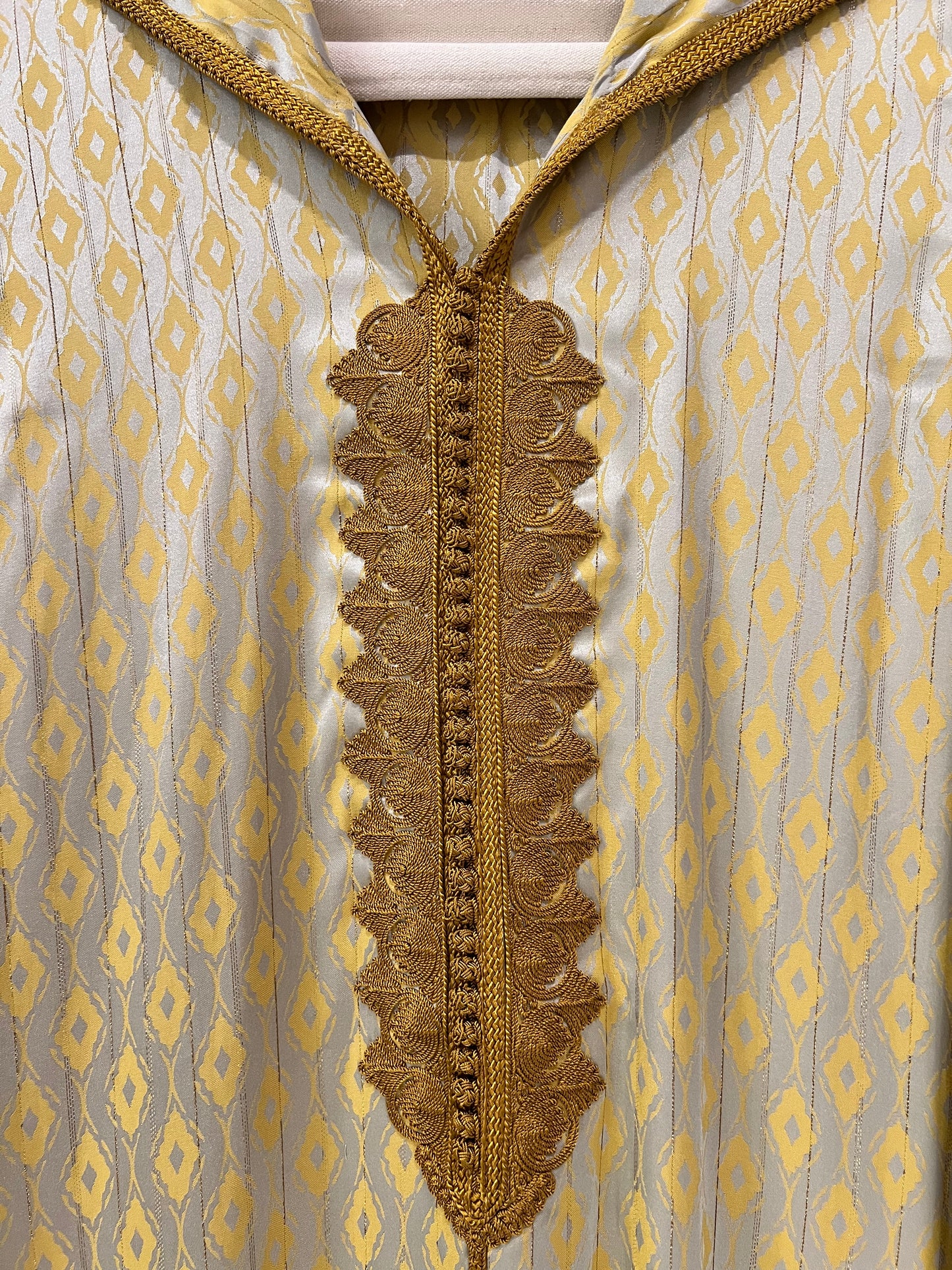 Jalabiyah - Elegant Soft beige base hooded with luminous gold pattern and embroidery