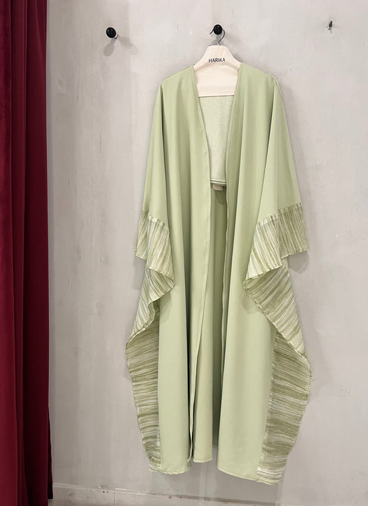 Abaya-Elegant sage green with flowy wide sleeves and soft textured striped detailing along the edges