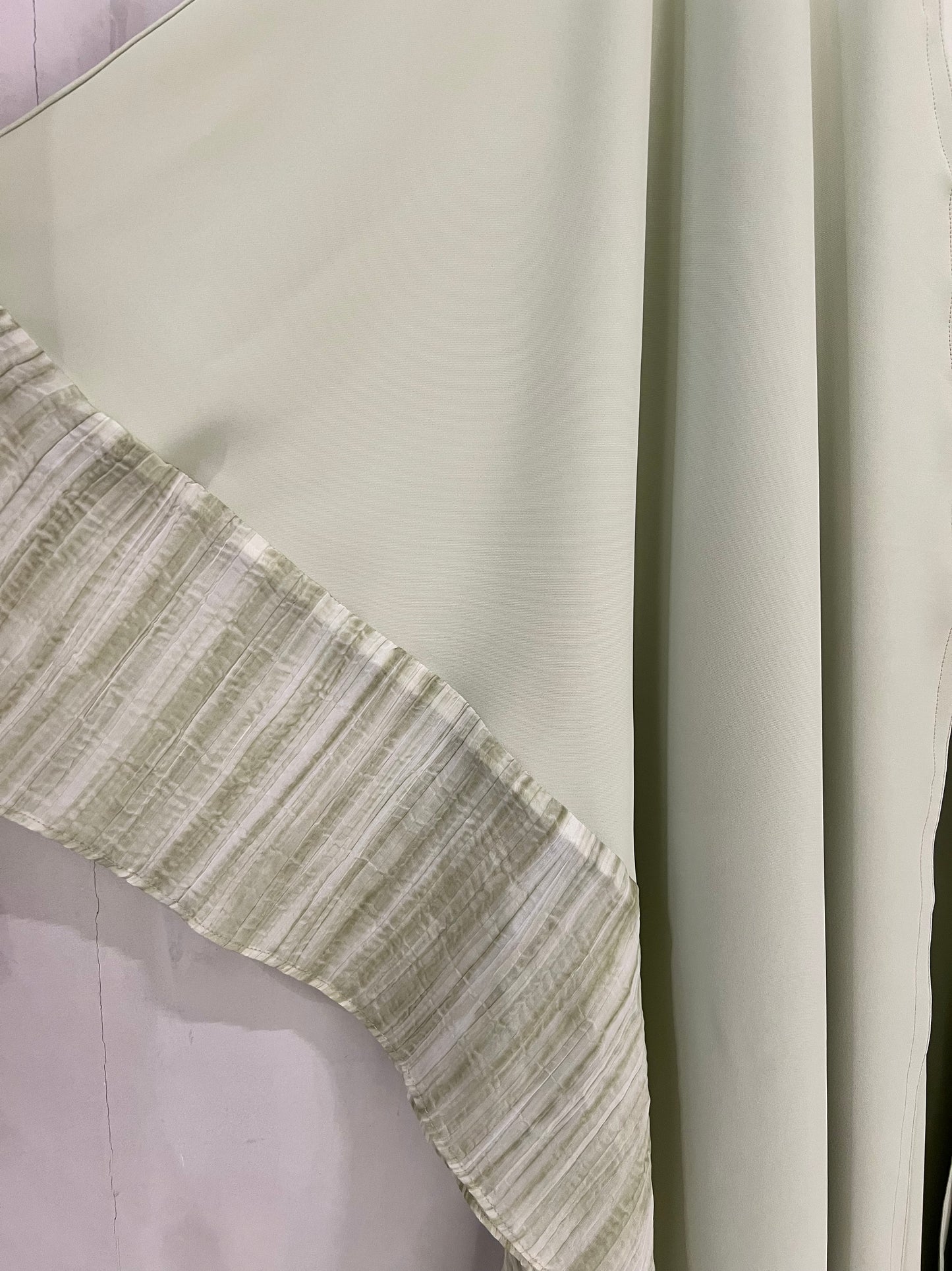 Abaya-Elegant sage green with flowy wide sleeves and soft textured striped detailing along the edges