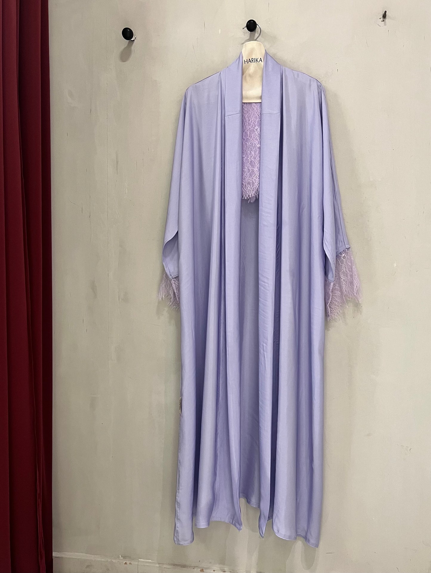 Abaya - Elegant lavender crafted from soft, flowy fabric with delicate lace detailing on the sleeves