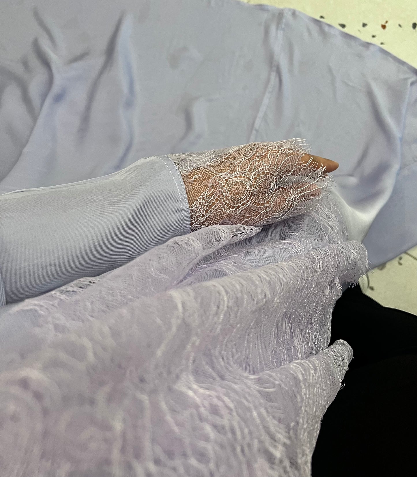 Abaya - Elegant lavender crafted from soft, flowy fabric with delicate lace detailing on the sleeves