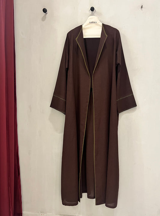 Abaya - Chocolate Brown - Clean tailoring with subtle contrast piping and delicate stitch details on the sleeves