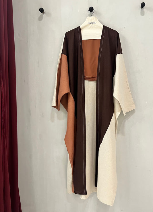 Abaya - Color-blocked abaya featuring a rich chocolate brown, soft cream, and warm terracotta palette
