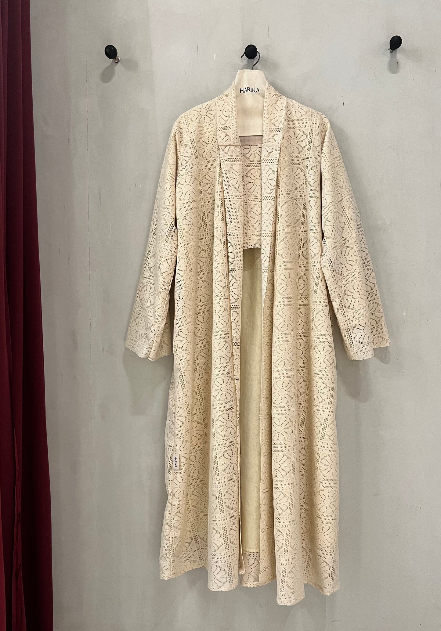 Abaya - a soft cream-beige color with an elegant floral lace overlay