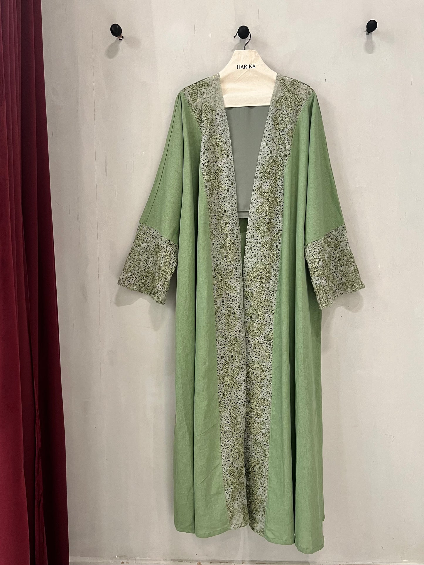 Abaya - Sage green exudes sophistication with its soft, earthy tone and refined lace detailing