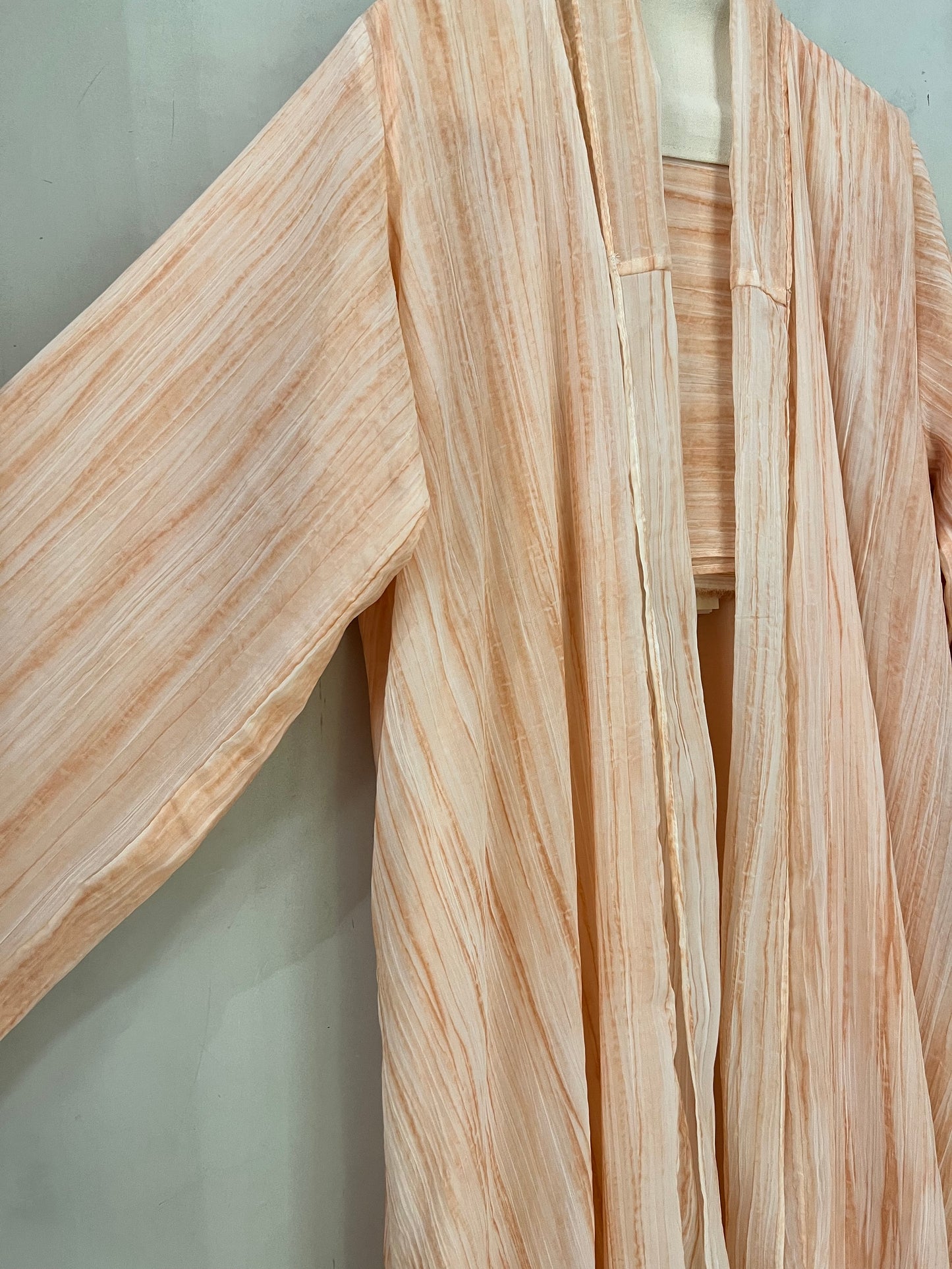 Abaya - Peach-toned radiates softness and sophistication with its beautifully textured crinkled fabric