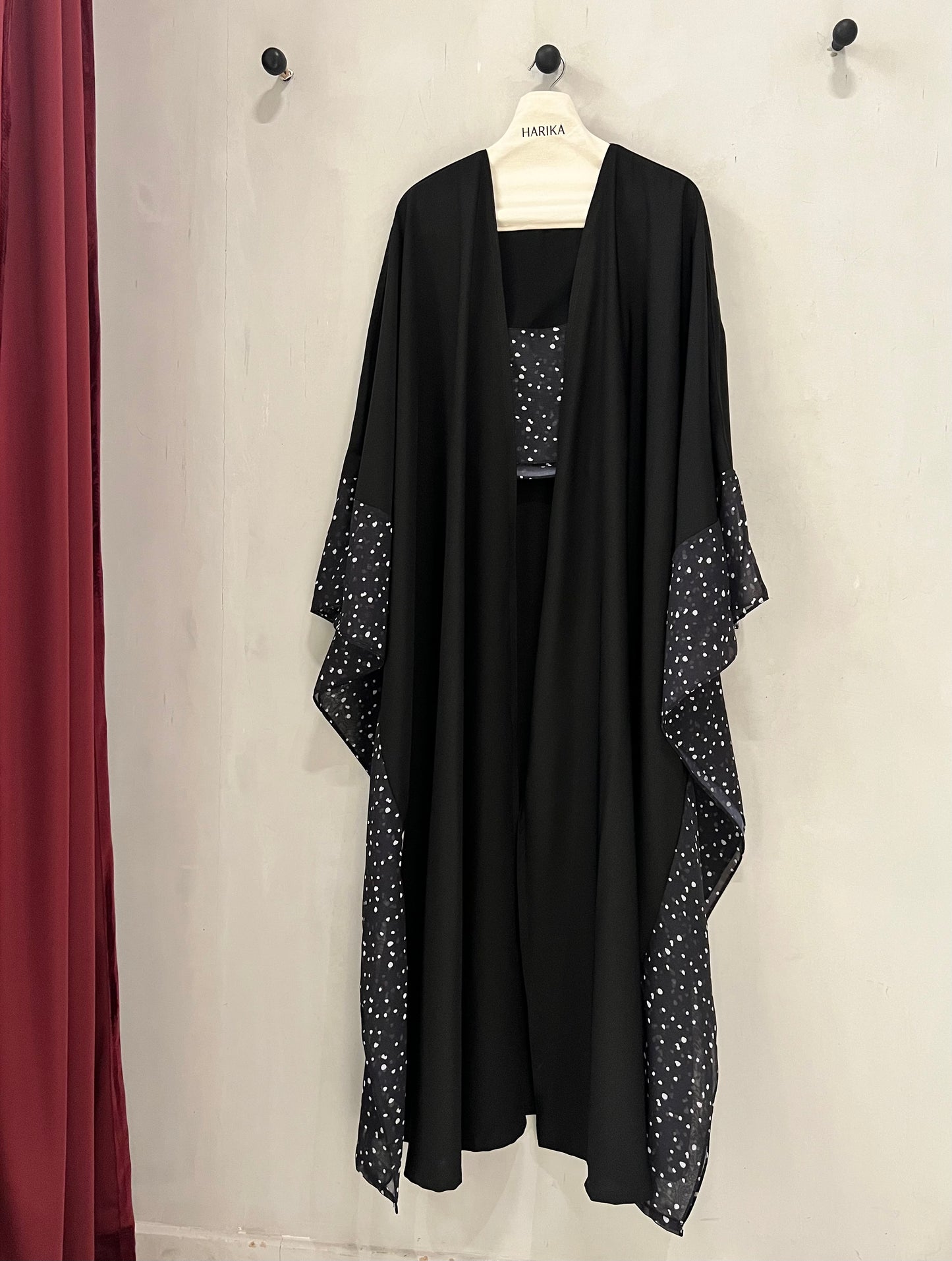 Abaya- Black kaftan style, beautifully enhanced with delicate white polka dot accents