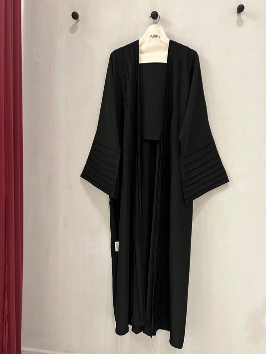 Abaya- Crafted with elegant pleated sleeves and a graceful silhouette that never goes out of style