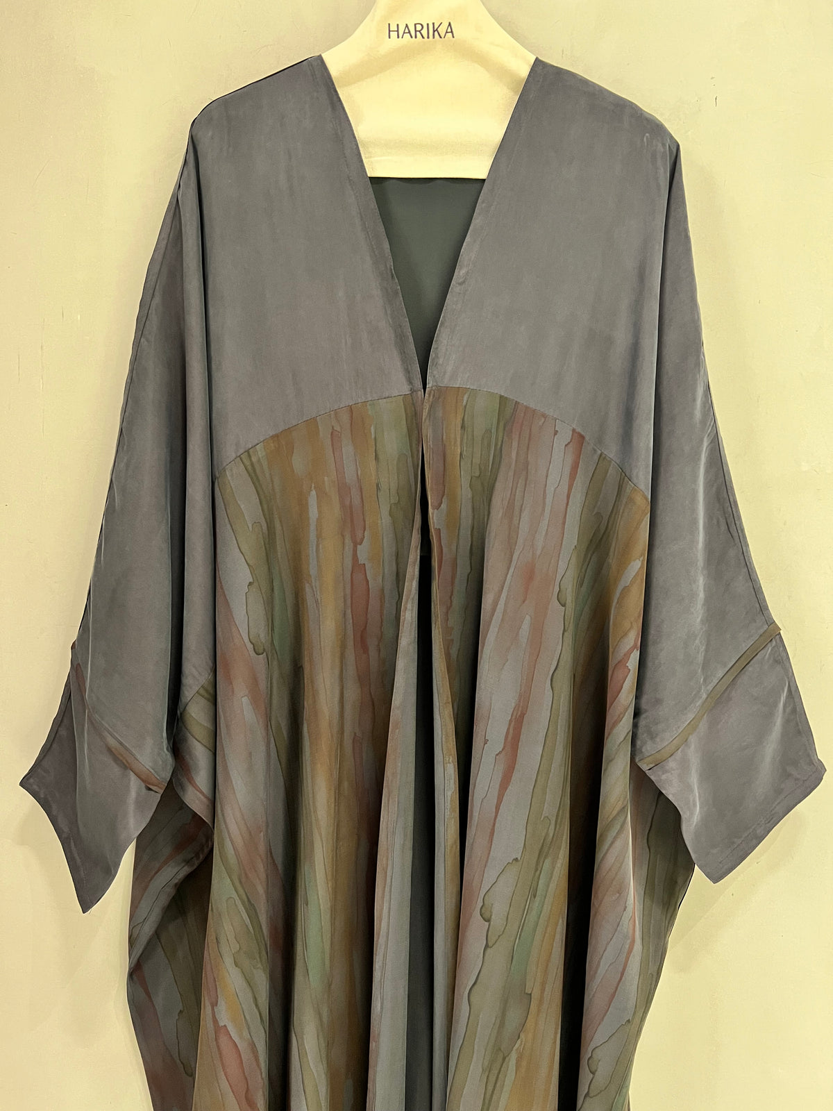 Abaya- a gorgeous dark gray, features flowing marble-inspired panels