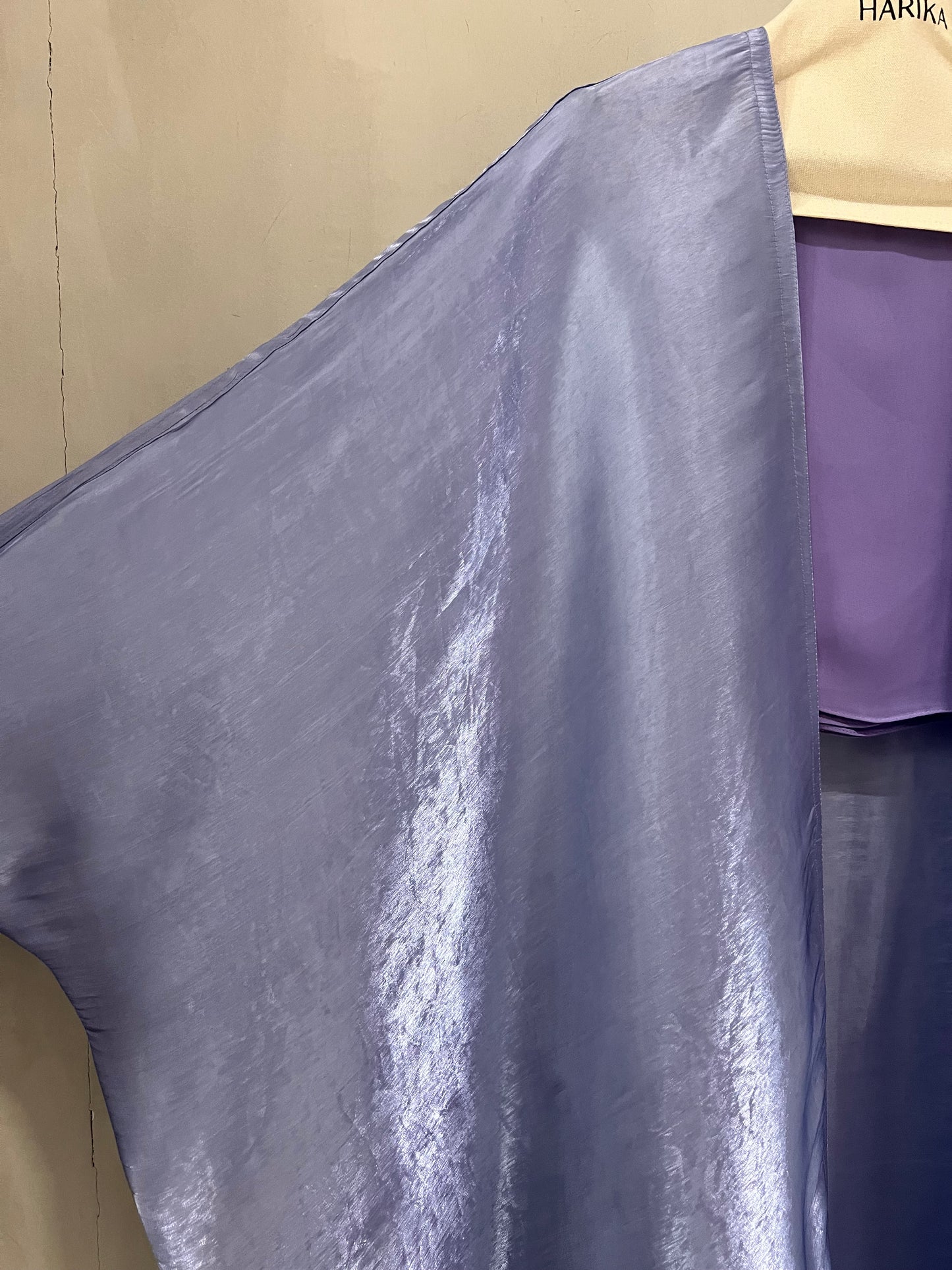 Abaya- elegant lavender shade with a luxurious satin finish that gives it a graceful, refined look