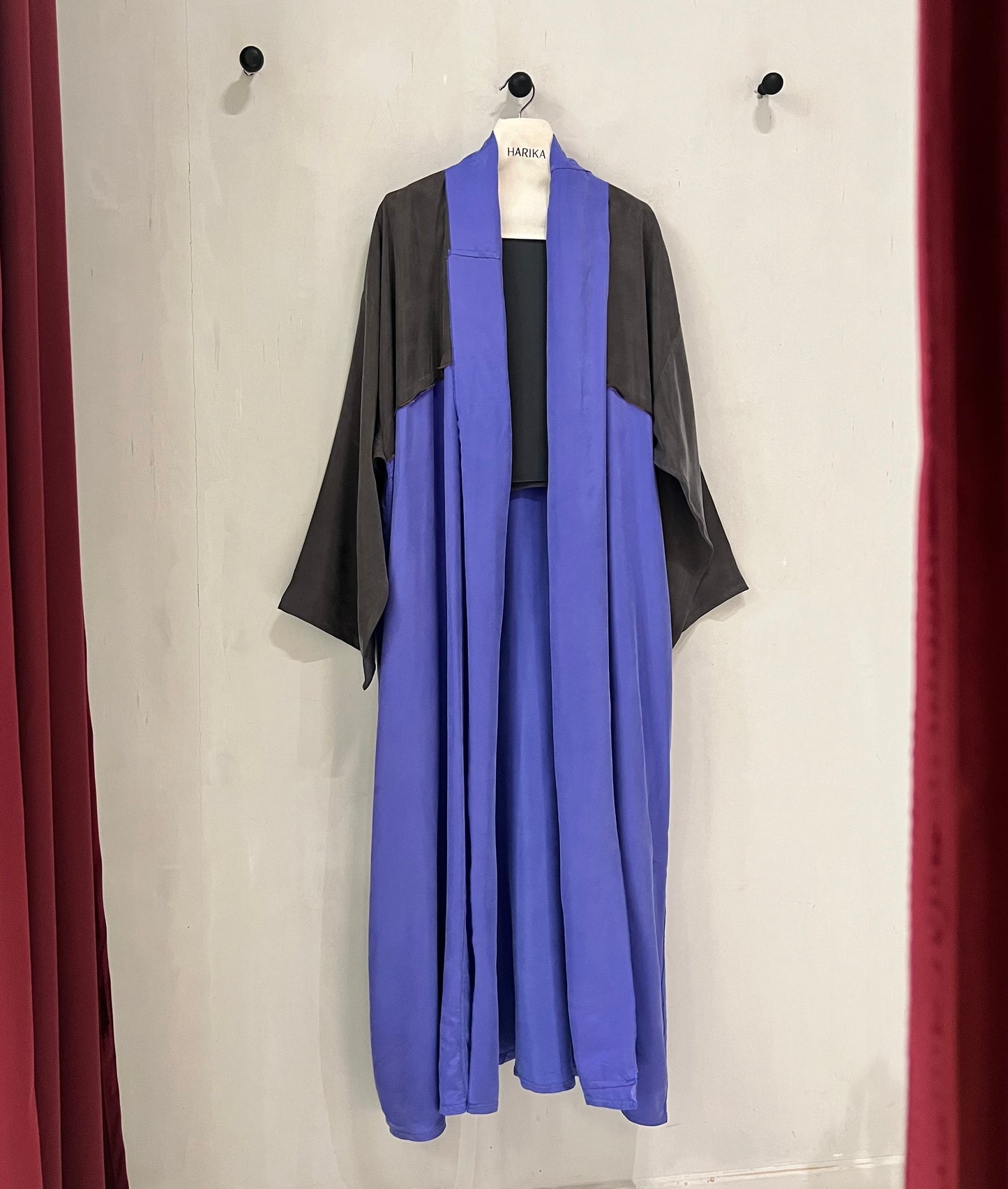 Abaya- a flowing amethyst purple accented with sleek black sleeves and shoulder panels