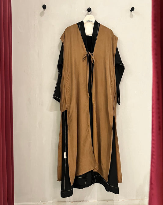 Abaya- a striking caramel brown and black abaya featuring a flowing open-front outer layer
