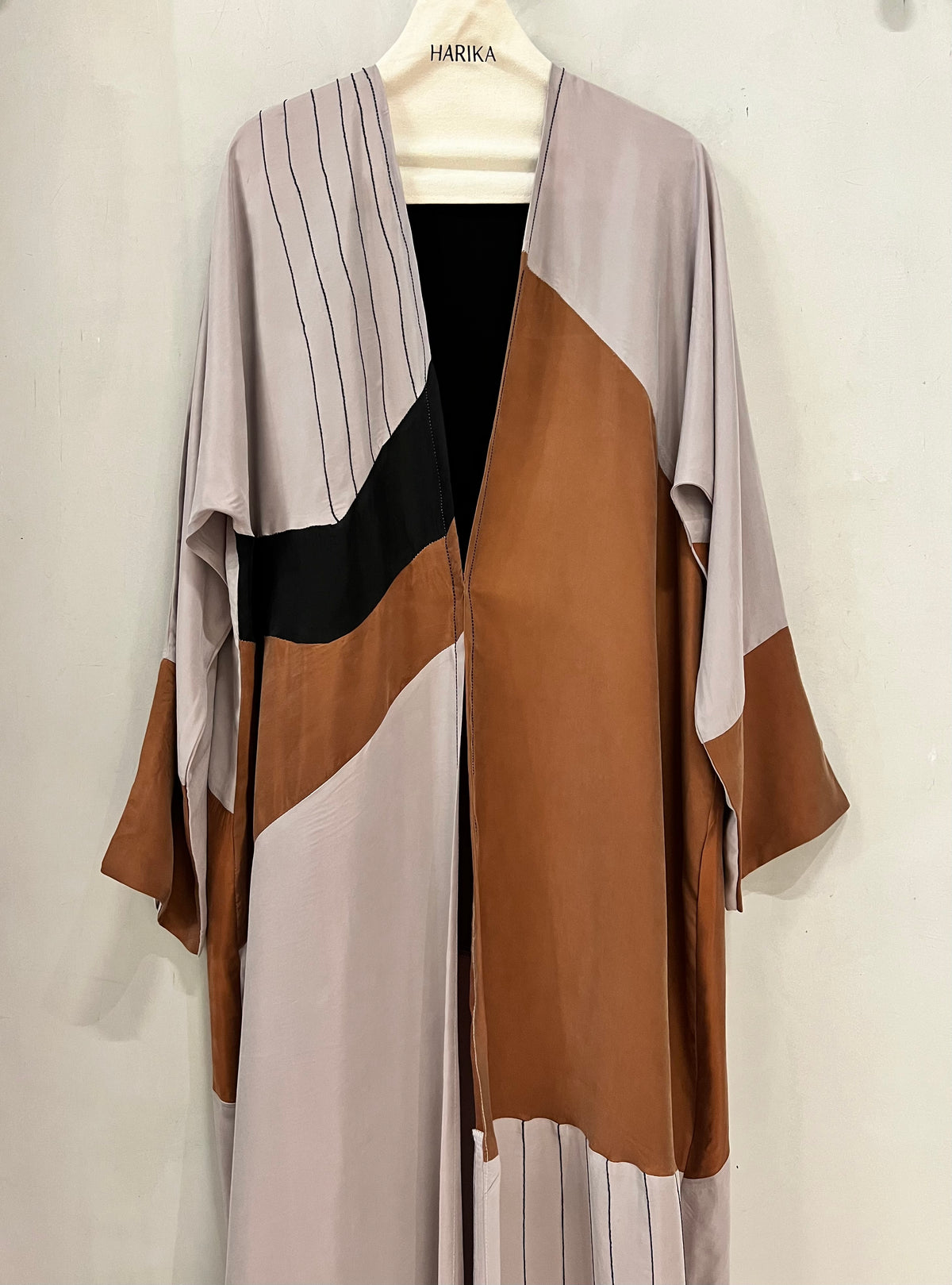 Abaya- a beautiful combination of warm caramel brown, soft taupe, black, and creamy beige.