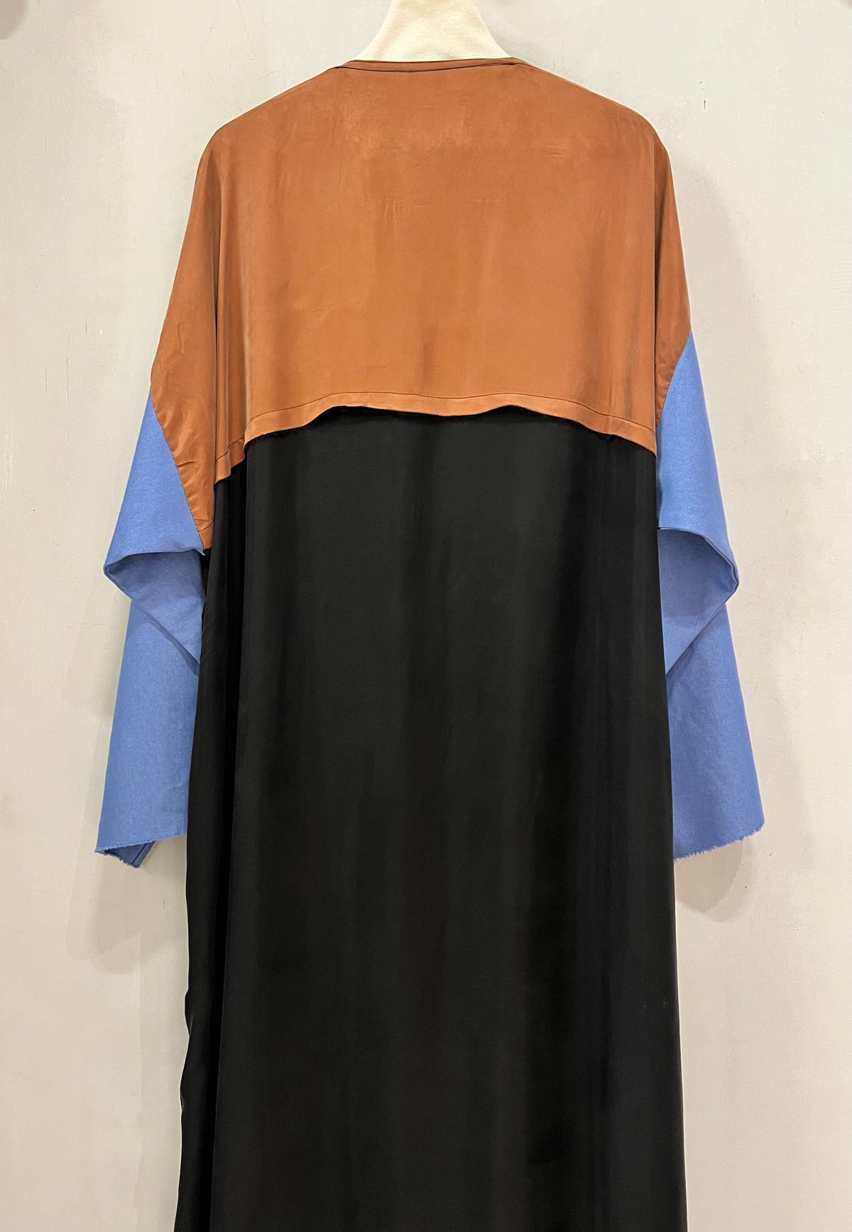 Abaya- A beautiful black and deep navy abaya accented with warm caramel brown and soft blue jeans sleeves