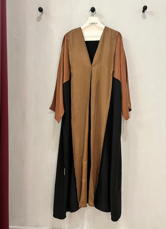 Abaya- A refined caramel and black abaya featuring a sleek layered design