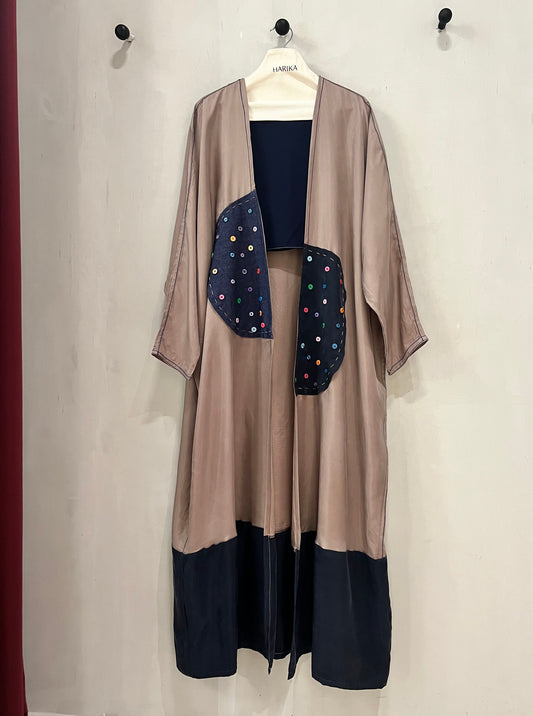 Abaya- A soft taupe-brown, layer in a deep navy with colored buttons accent
